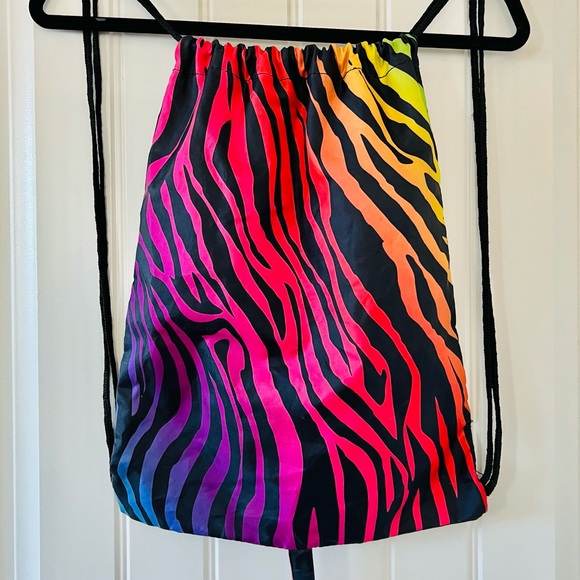 Spirit Halloween Drawstring Rainbow & Tiger Stripe Backpack with Dragon Tale - Picture 2 of 8